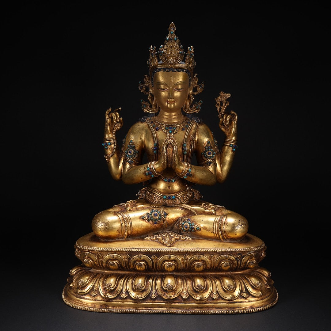 GILT BRONZE AVALOKITESHVARA STATUE WITH FOUR ARMS AND A LOTUS THRONE INLAID WITH GEMS: Length 25 cm, width 17.6 cm, height 32.5 cm, weight 5102 g