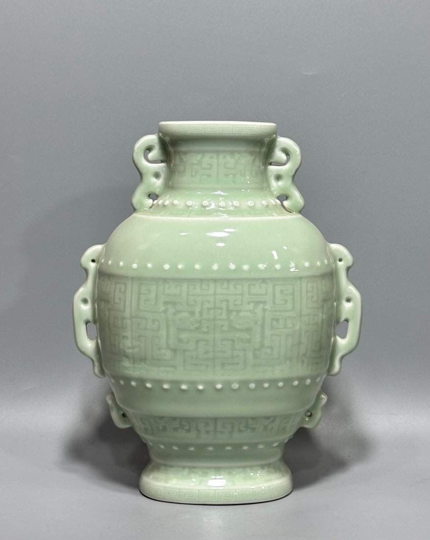 QING DYNASTY QIANLONG PERIOD CELADON FLAT FLASK WITH KUI DRAGON DESIGN: Height 23.5 cm