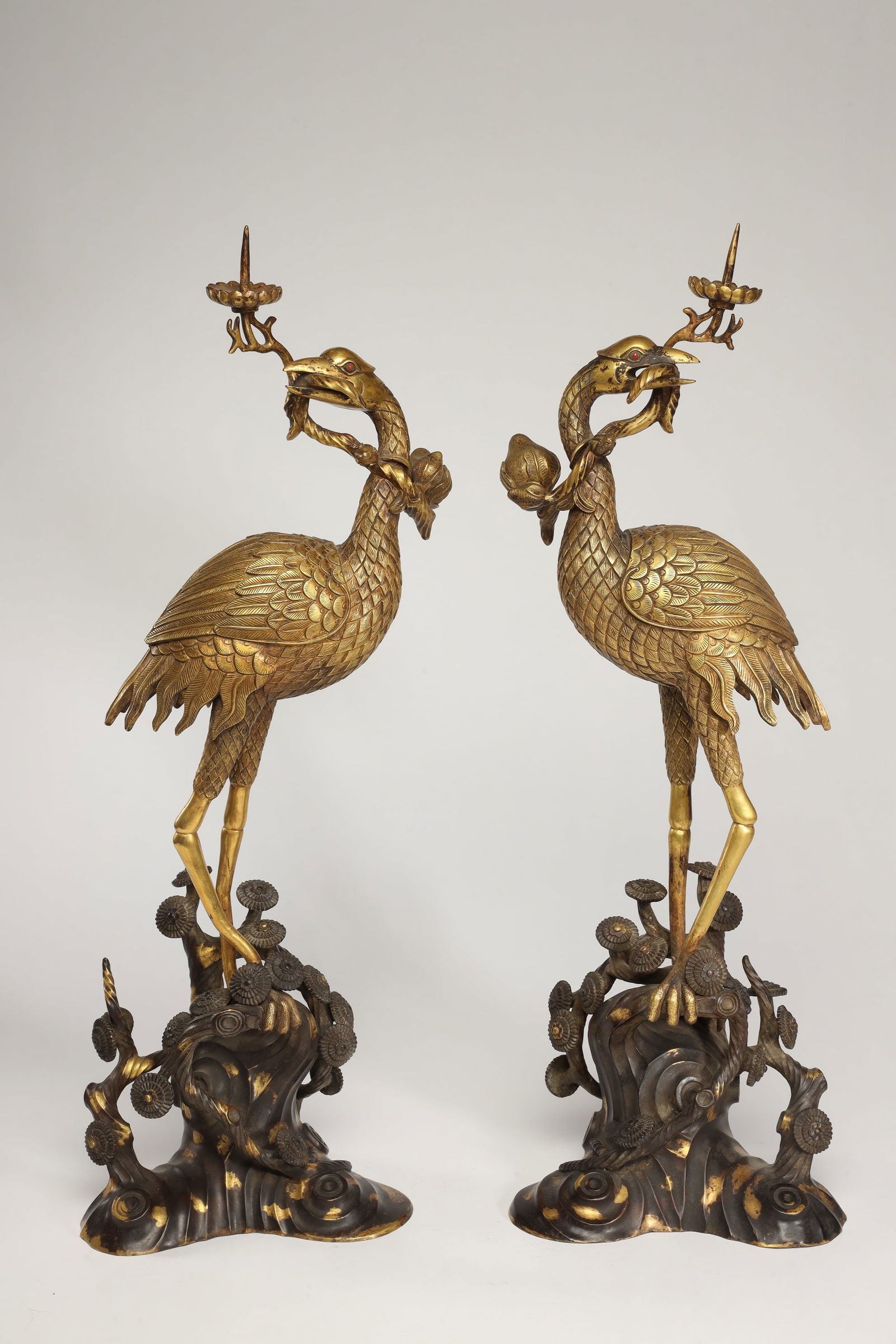 A QING DYNASTY GILT BRONZE CRANE CANDLESTICK: Height 62cm, Width 21cm