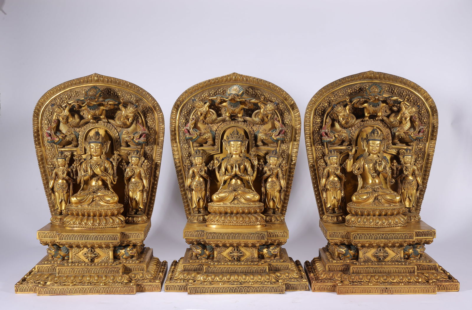 A SET OF GILT BRONZE THREE BUDDHAS: Height 44.5cm