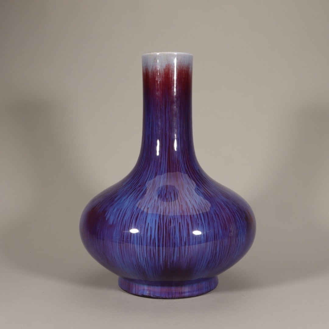 A QIANLONG-ERA WATER CHESTNUT-SHAPED VASE WITH A TRANSMUTED GLAZE (1 of 9)
