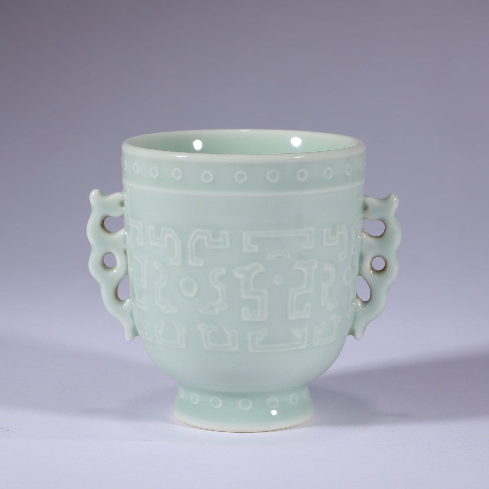 CELADON DOUBLE-EARED CUP: 8.7cm in height.