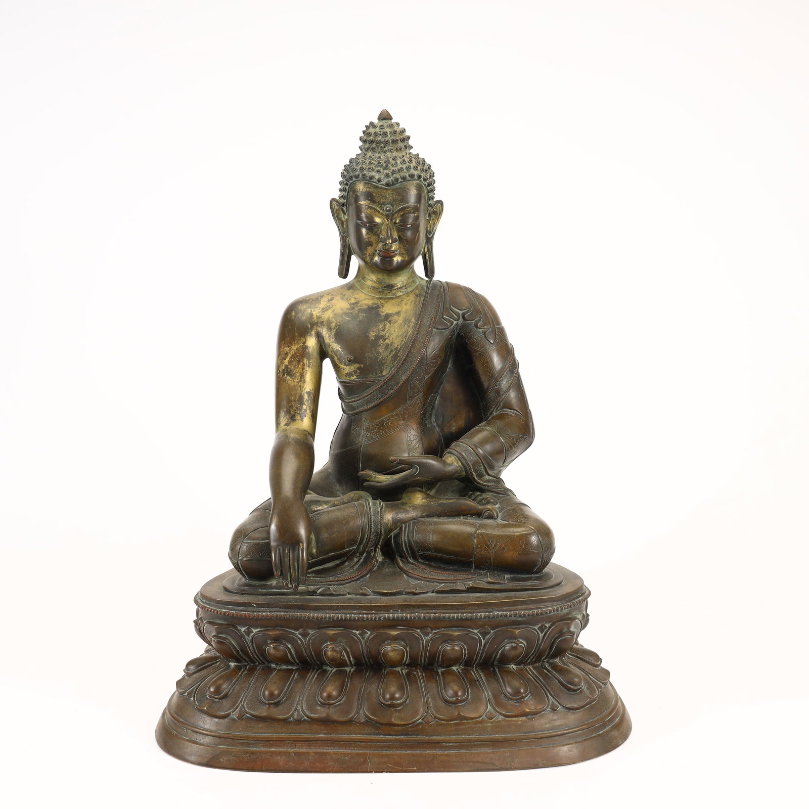 QING DYNASTY, TIBETAN BUDDHIST, GILT BRONZE VAIROCANA BUDDHA: Height 51cm, Width 39.5cm