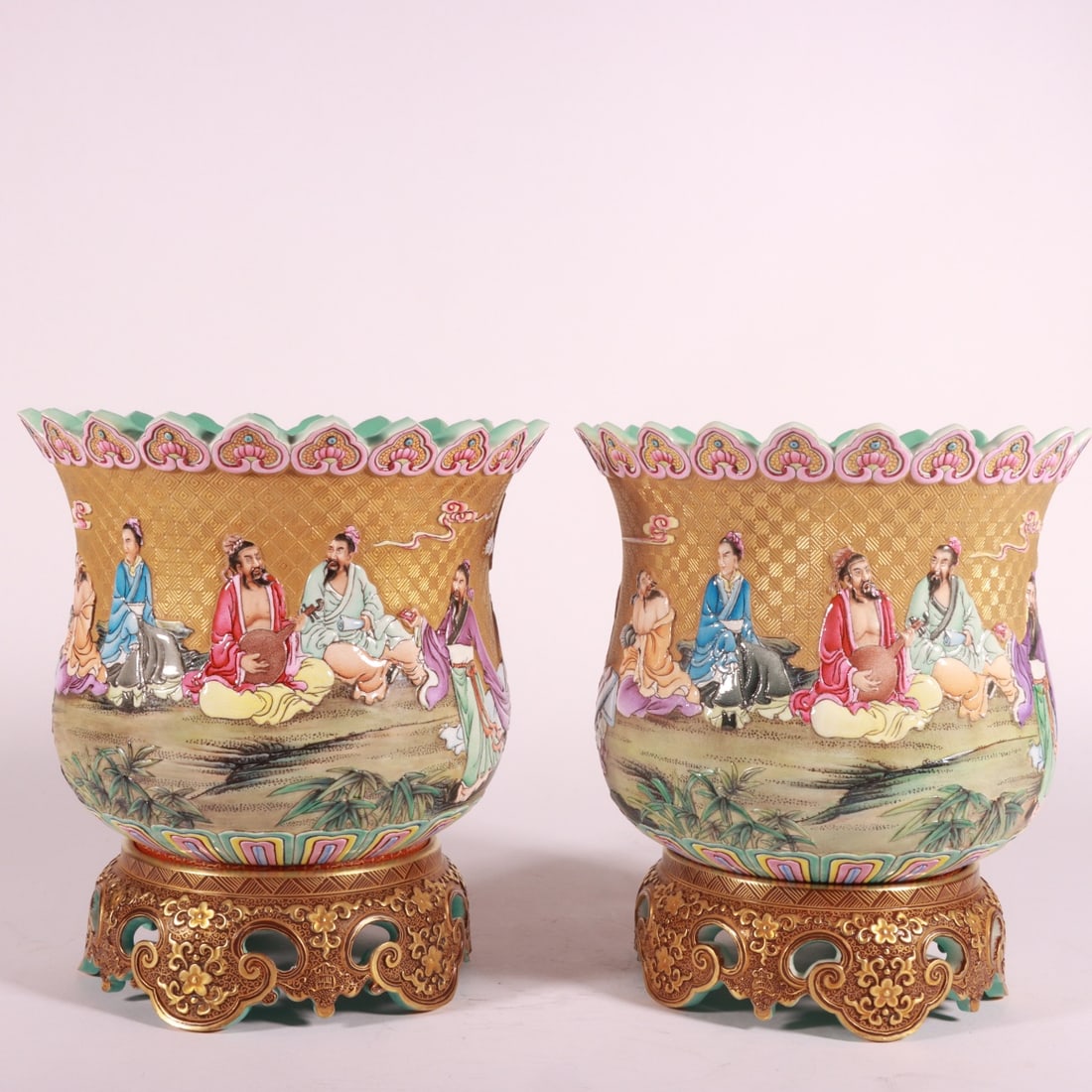 QING DYNASTY QIANLONG PERIOD ENAMEL CARVED GOLD GROUND BAMBOO GROVE AND SEVEN SAGES FLOWERPOT: Height 18.5 cm, Belly diameter 17.5 cm