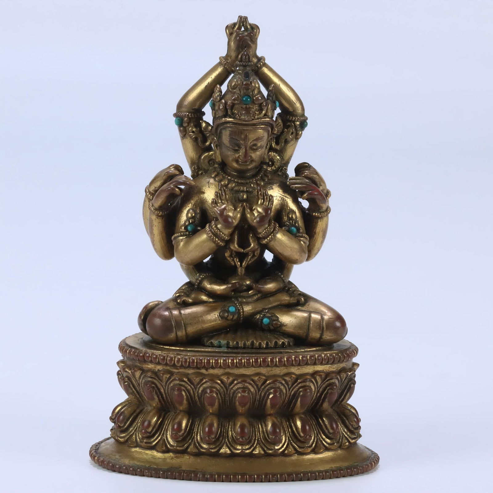 QING DYNASTY GILT BRONZE EIGHT-ARMED GUANYIN SEATED STATUE (1 of 13)