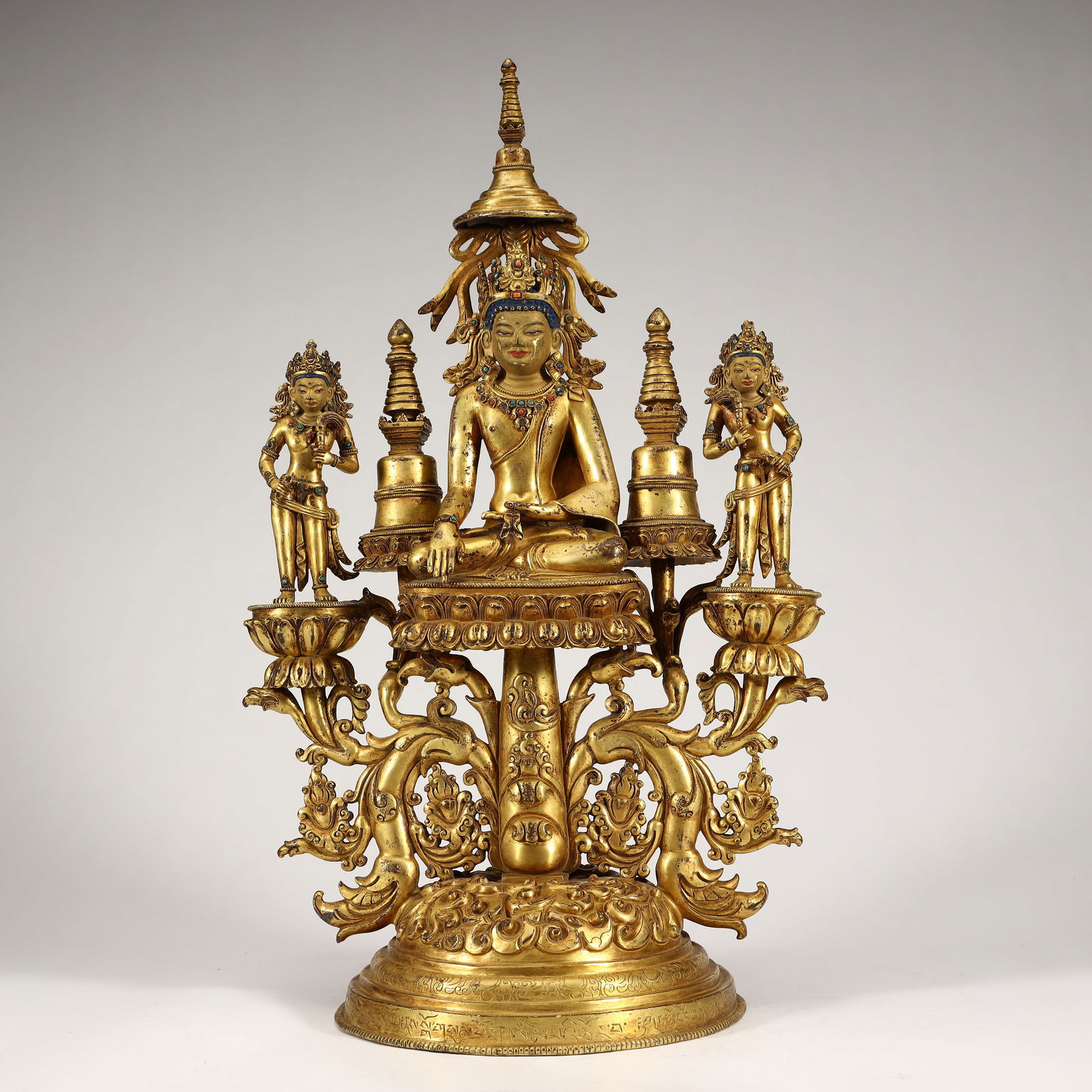 16TH CENTURY GILT BRONZE SHAKYAMUNI BUDDHA WITH JEWELED CROWN: Height 47.5cm, Width 29cm