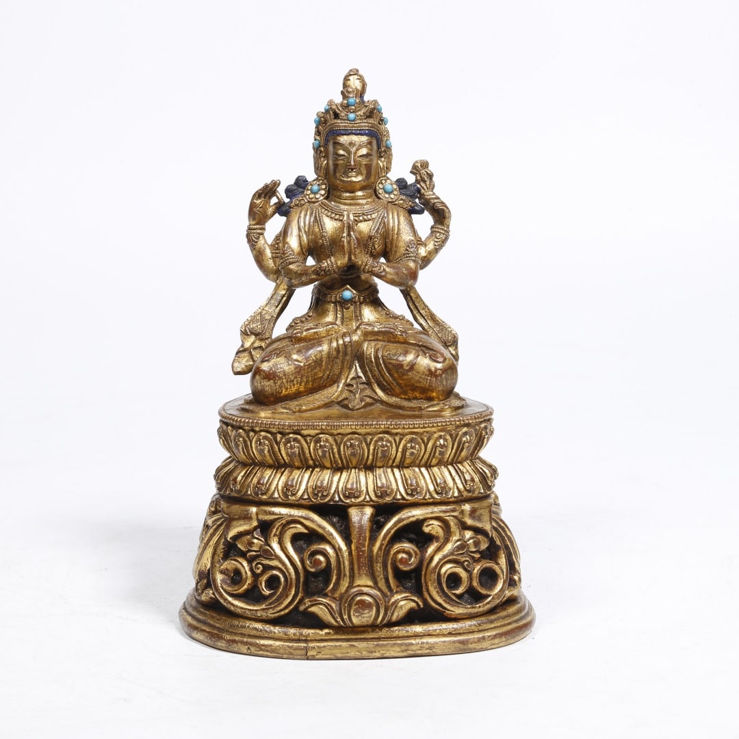GILT BRONZE AVALOKITESHVARA STATUE INLAID WITH GEMSTONES: Length 10.5cm, Width cm, Height 16cm, Weight 769g.