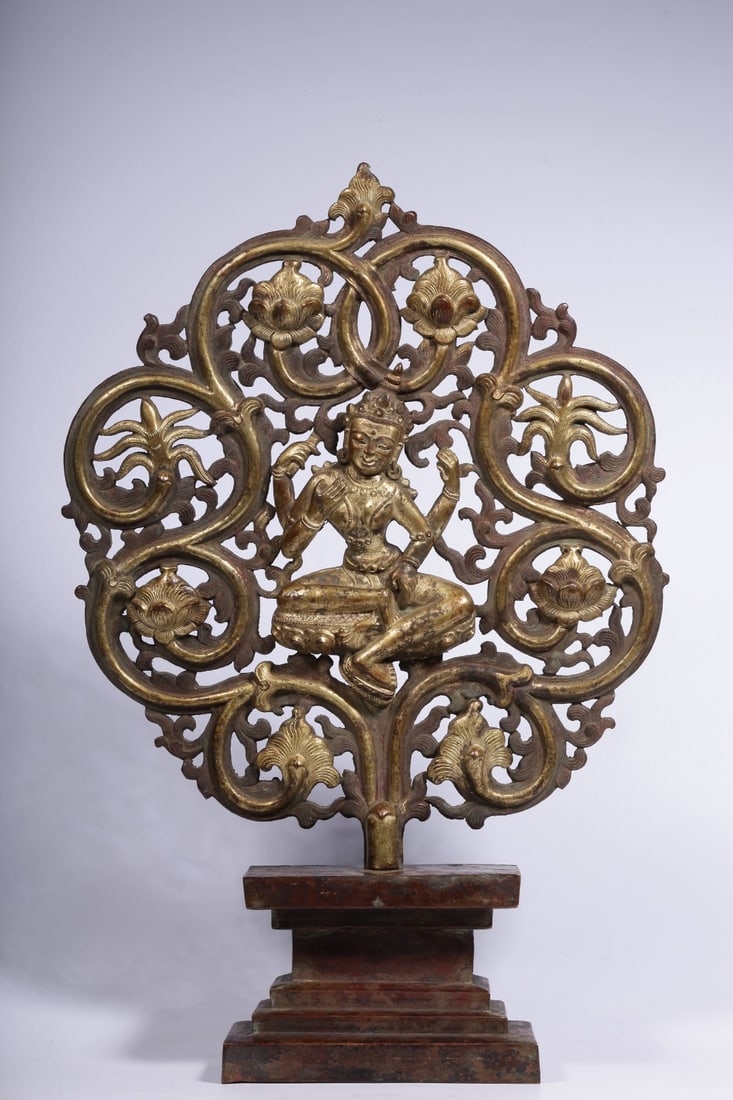 QING DYNASTY, GILT BRONZE HAMMERED FOUR-ARMED GUANYIN TREE: H.41CM?L.28CM