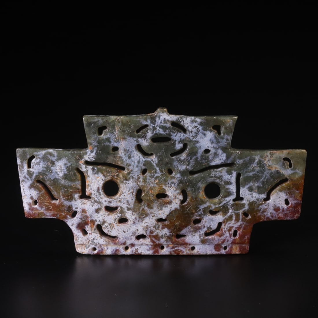 JADE CROWN-SHAPED ARTIFACT: Dimensions: 11.9x6.1x0.6cm, Weight: 77g