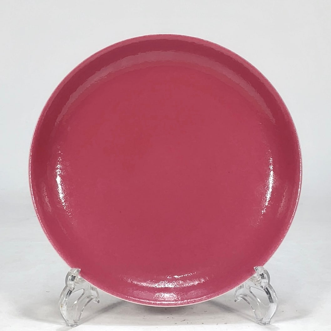 A ROUGE-RED GLAZED APPRECIATION PLATE MADE DURING THE DAOGUANG PERIOD OF THE QING DYNASTY (1 of 6)