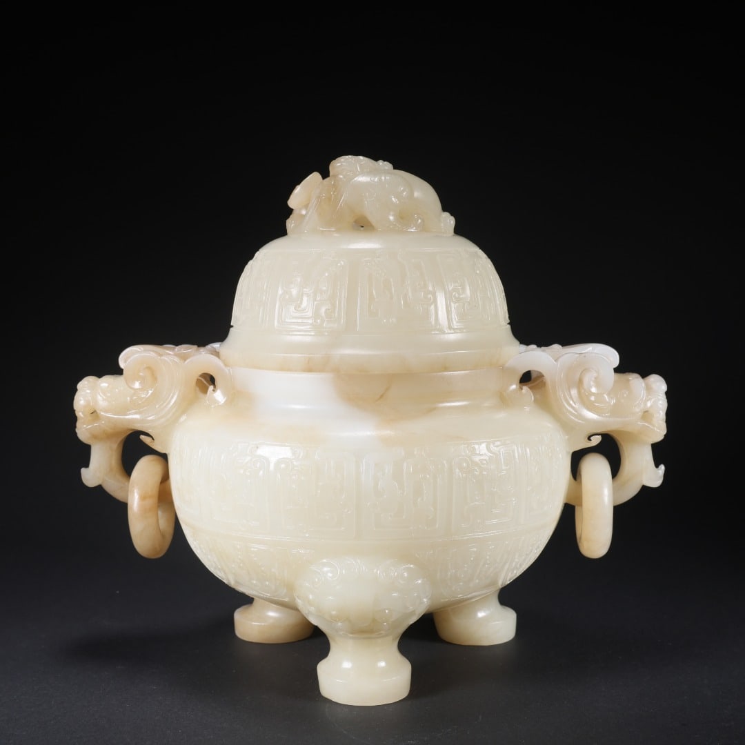 HETIAN JADE DOUBLE-RING THREE-DRAGON LID INCENSE BURNER: It measures 21.3 cm in length, 15 cm in width, and 18.3 cm in height, and weighs 1557 grams.