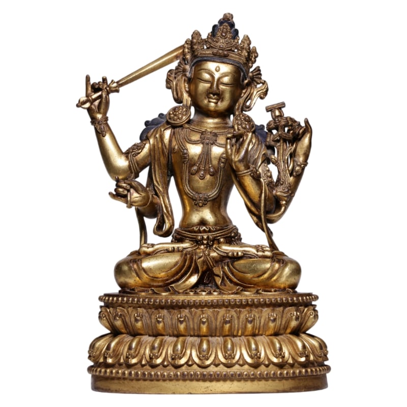 A GILT BRONZE FOUR-ARMED MANJUSHRI BODHISATTVA STATUE FROM THE QING DYNASTY.: It measures 24.5 cm in height, 15 cm in length, and 10.5 cm in width, and weighs 3182 grams.