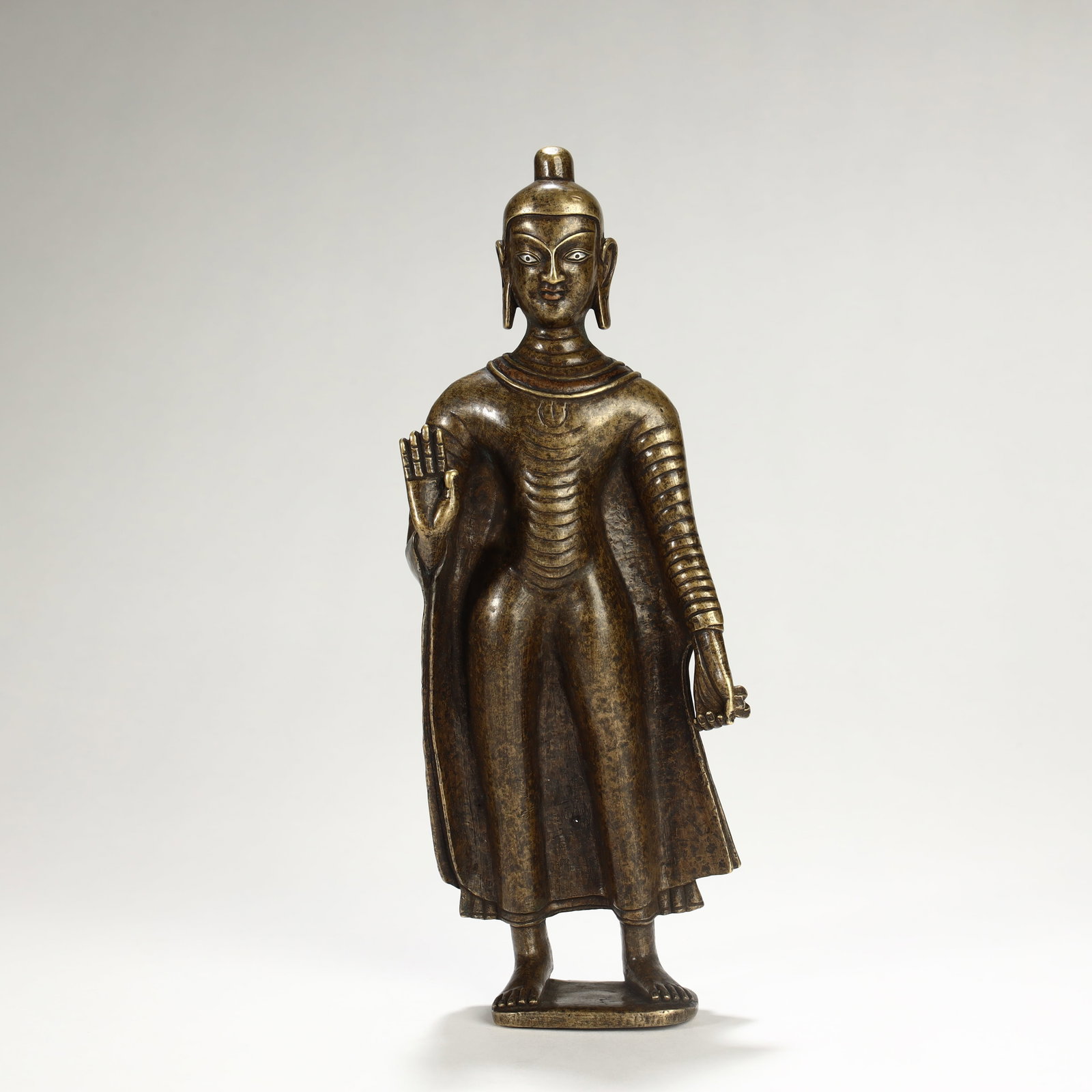 STANDING VAIROCANA BUDDHA STATUE MADE OF ALLOY COPPER INLAID WITH SILVER DURING THE QING DYNASTY: 22cm tall