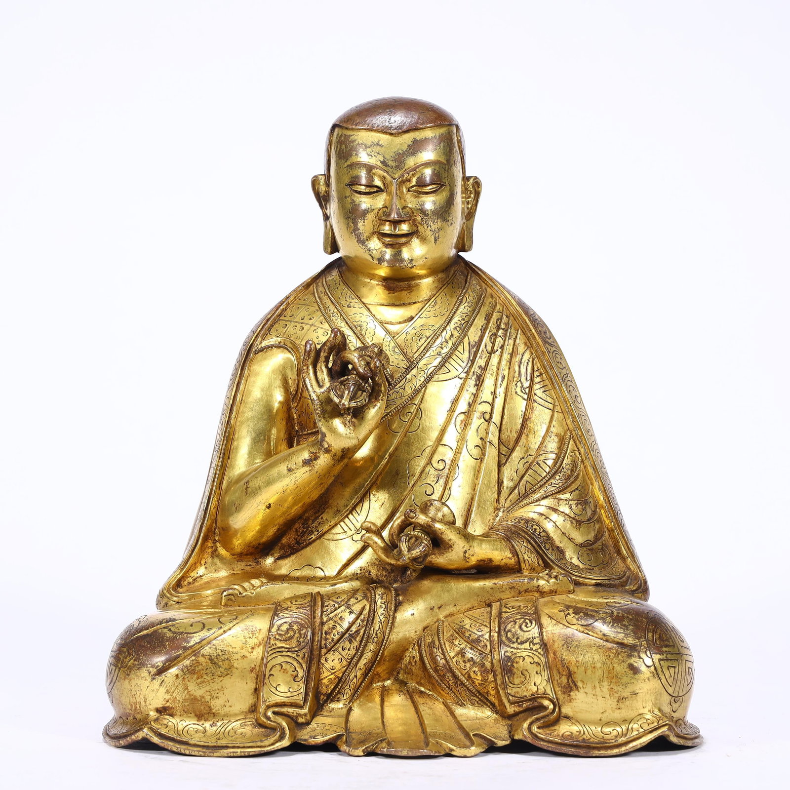 GILDED BRONZE STATUE OF A GURU: 25cm tall