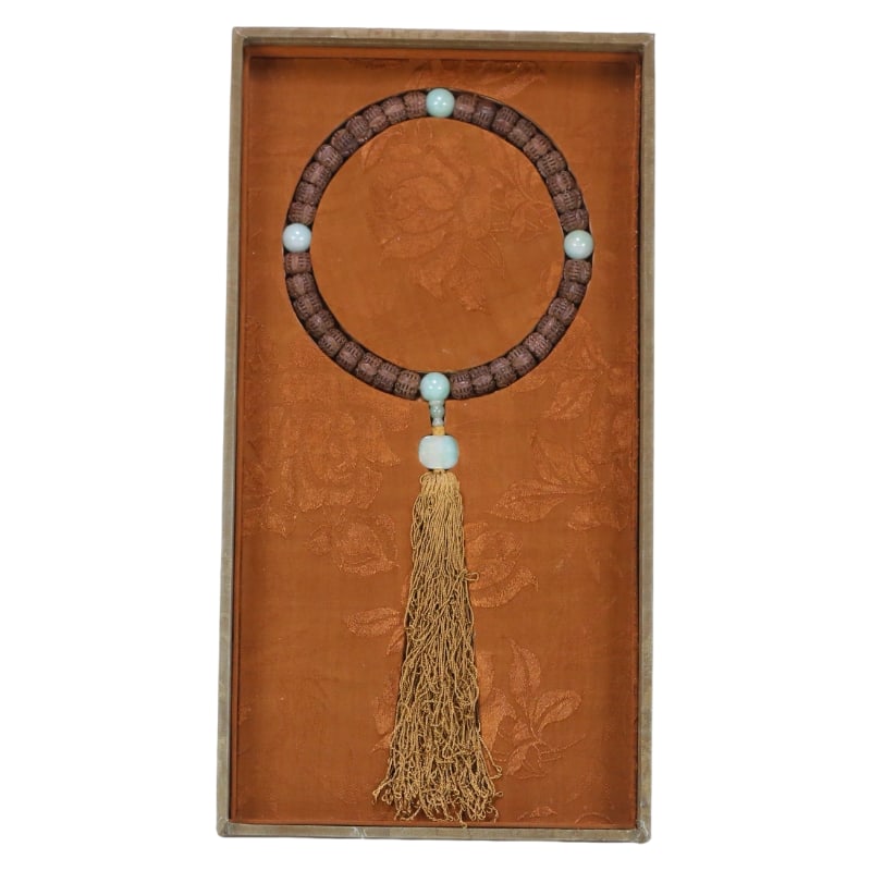 OLD QING DYNASTY AGARWOOD WITH THIRTY-SIX LONGEVITY PATTERN HANDHELD: Dimensions: 1.4 x 1 cm, Weight: 57.5 grams