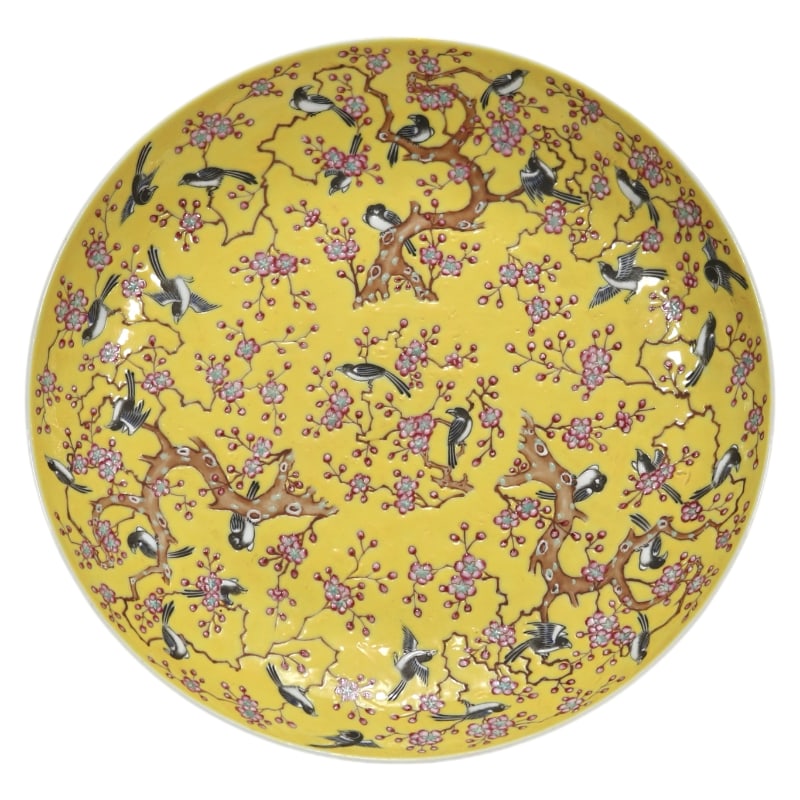 A FAMILLE ROSE PLATE WITH A MAGPIE ON A PLUM BLOSSOM ON A YELLOW GROUND, MADE DURING THE TONGZHI (1 of 8)