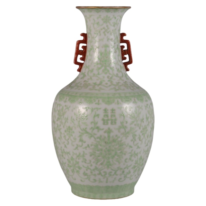 DAOGUANG PERIOD GREEN ENAMEL DOUBLE-EARED VASE WITH SCROLLING FLORAL DESIGN: Height 29.8 cm, belly diameter 15 cm, mouth diameter 8.5 cm