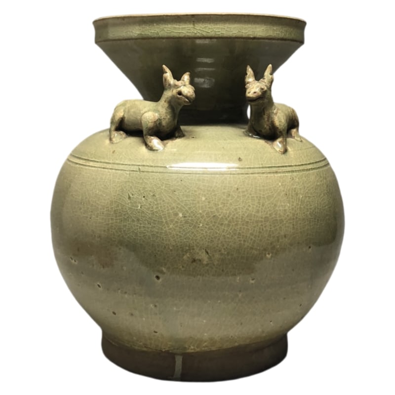 CELADON VASE WITH DOUBLE RAM HANDLES AND PROTRUDING FLANGES?: 21cm tall