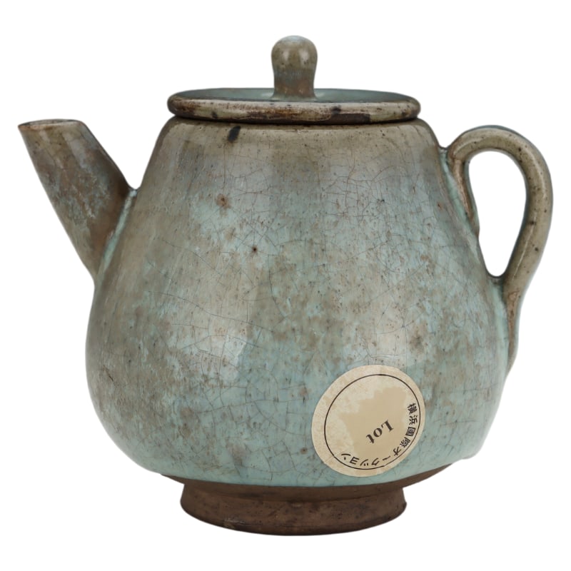 YUAN DYNASTY JUN WARE PEAR-SHAPED EWER WITH PURPLE-RED SPECKLED GLAZE: Height: 10.5 cm. Belly diameter: 11.7 cm.