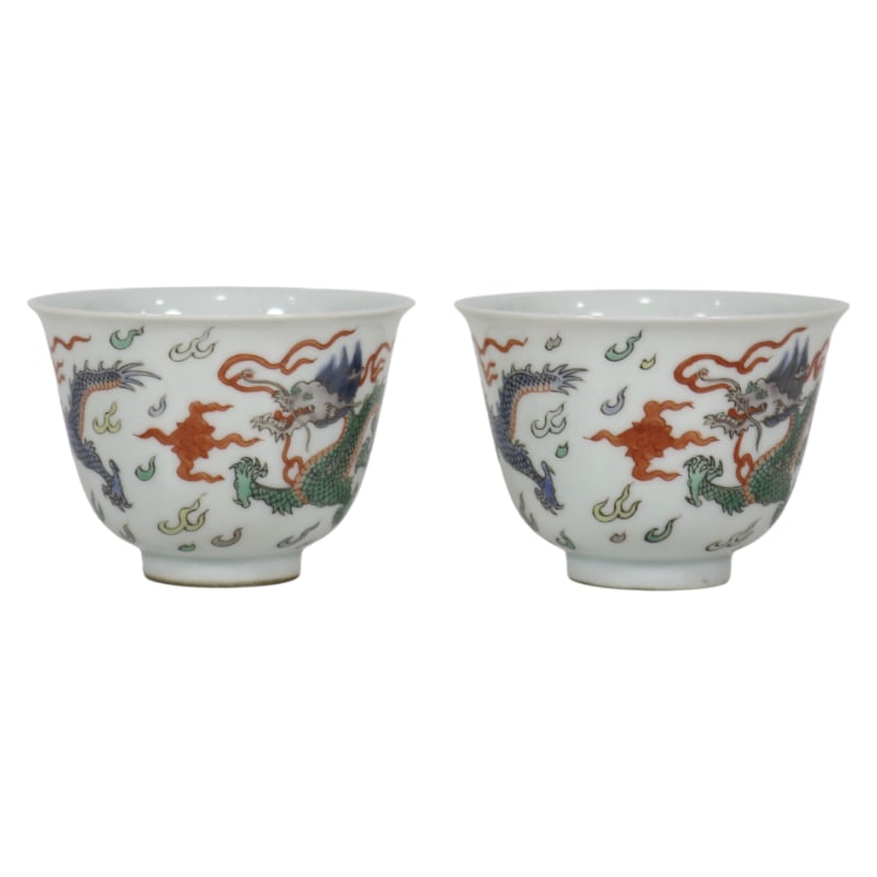 A PAIR OF BLUE AND WHITE PORCELAIN CUPS WITH POLYCHROME DOUBLE DRAGONS PLAYING WITH A PEARL, MADE (1 of 9)