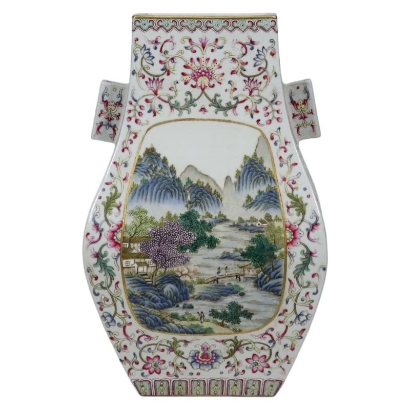 A SQUARE VASE WITH FAMILLE ROSE LANDSCAPE DESIGN AND HANDLES, BEARING THE MARK OF THE QING DYNASTY'S: Height 32 cm, belly width 20 cm