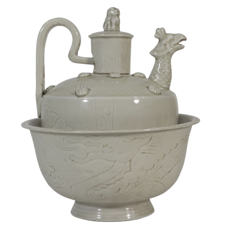 SONG DYNASTY WHITE DING WARE WARM WINE POT WITH DRAGON AND PHOENIX DESIGN: Overall height 23.5 cm, rim diameter 20.5 cm