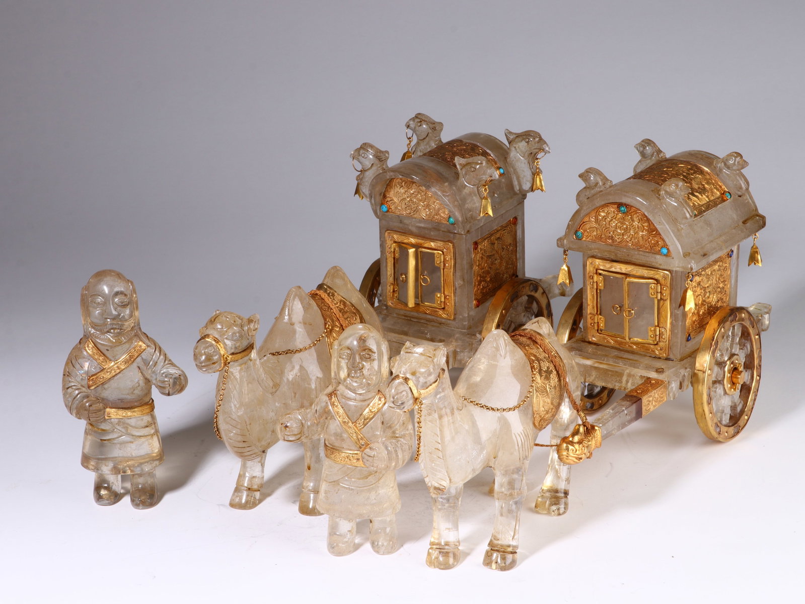 A PAIR OF CRYSTAL HORSES: Height 16.5cm, Width 22cm; Height 19cm, Width 43cm