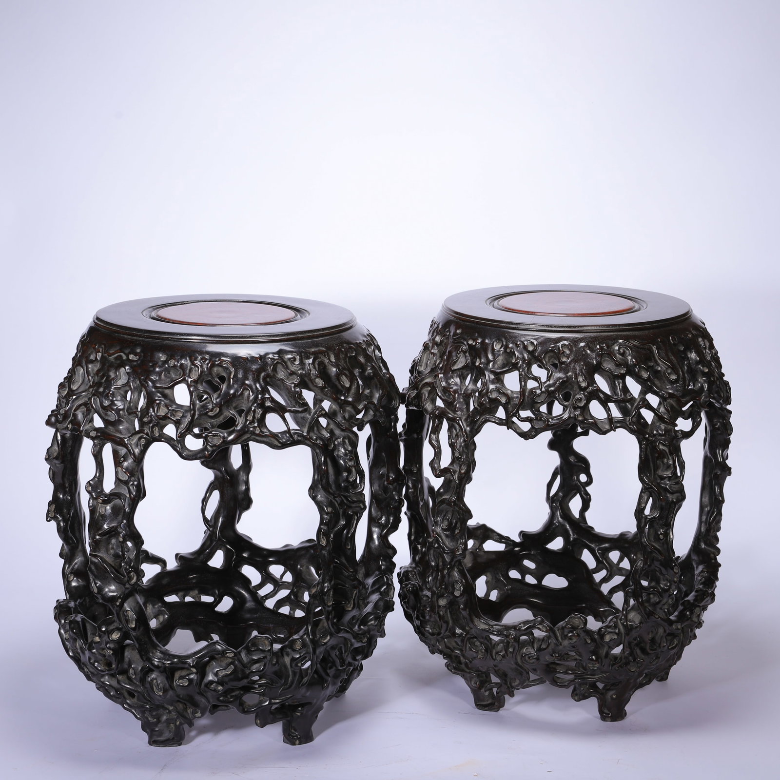 A PAIR OF ROSEWOOD DRUM STOOLS: 43cm tall