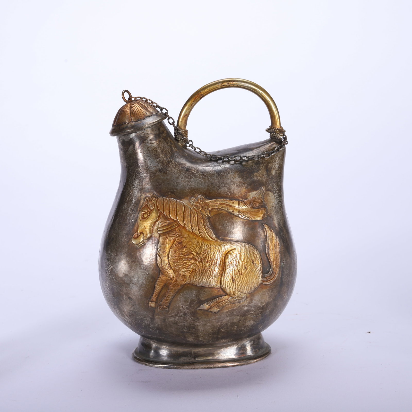 GILDED BRONZE AND SILVER LEATHER POT: Length 12 cm, Height 17.5 cm