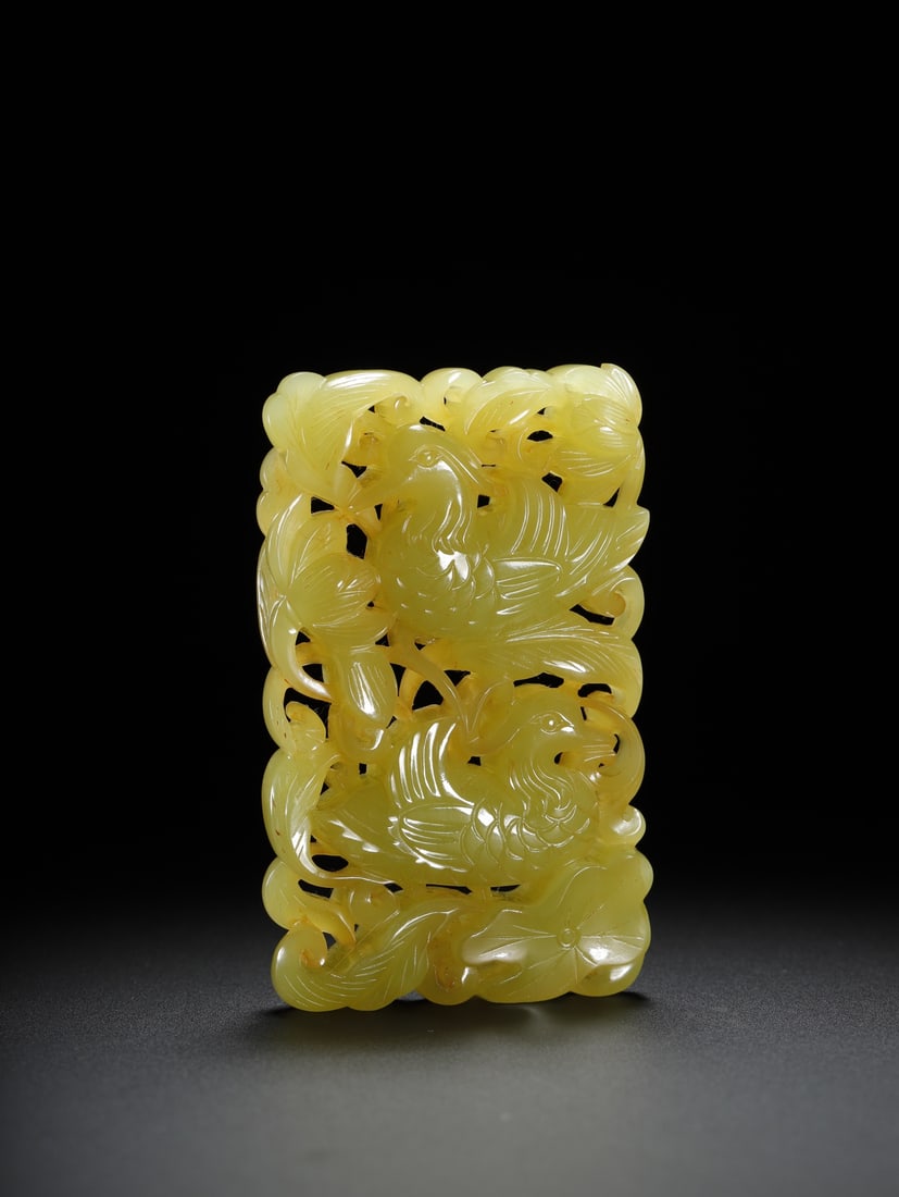 HETIAN YELLOW JADE PLAQUE WITH MANDARIN DUCKS PLAYING AMONG LOTUS FLOWERS: 7.3 × 4.5 × 1.3 cm, weight 66.3 g