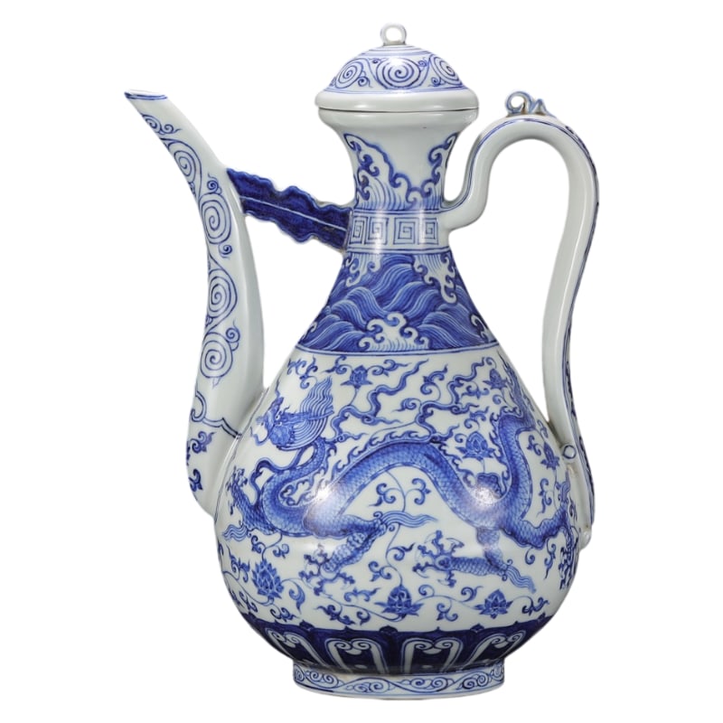 LARGE BLUE AND WHITE PORCELAIN EWER WITH A DESIGN OF DRAGONS AMIDST WAVES FROM THE YONGLE PERIOD OF: 32 cm tall