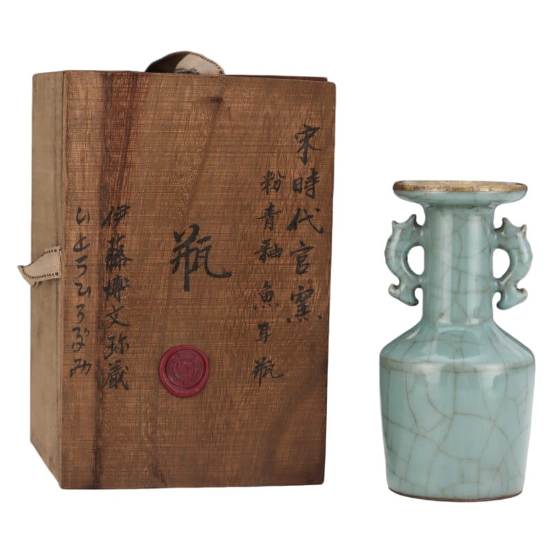 SONG DYNASTY OFFICIAL KILN CELADON-GLAZED FISH-EAR VASE: Height: 15 cm. Belly diameter: 7.5 cm.