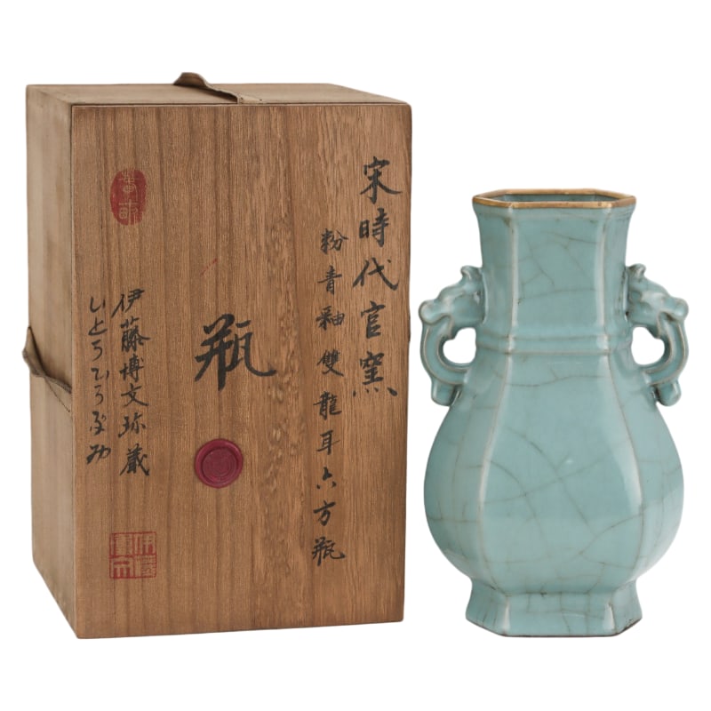 SONG DYNASTY GUAN KILN CELADON-GLAZED HEXAGONAL VASE WITH DOUBLE DRAGON HANDLES: Height: 23.2 cm. Belly diameter: 14 cm
