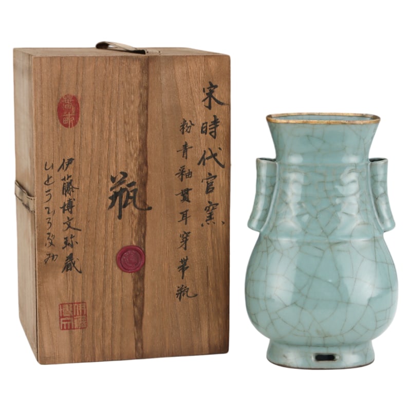 SONG DYNASTY GUAN KILN CELADON-GLAZED VASE WITH STRAPS AND HANDLES: Height: 22.7 cm. Belly diameter: 14 cm.