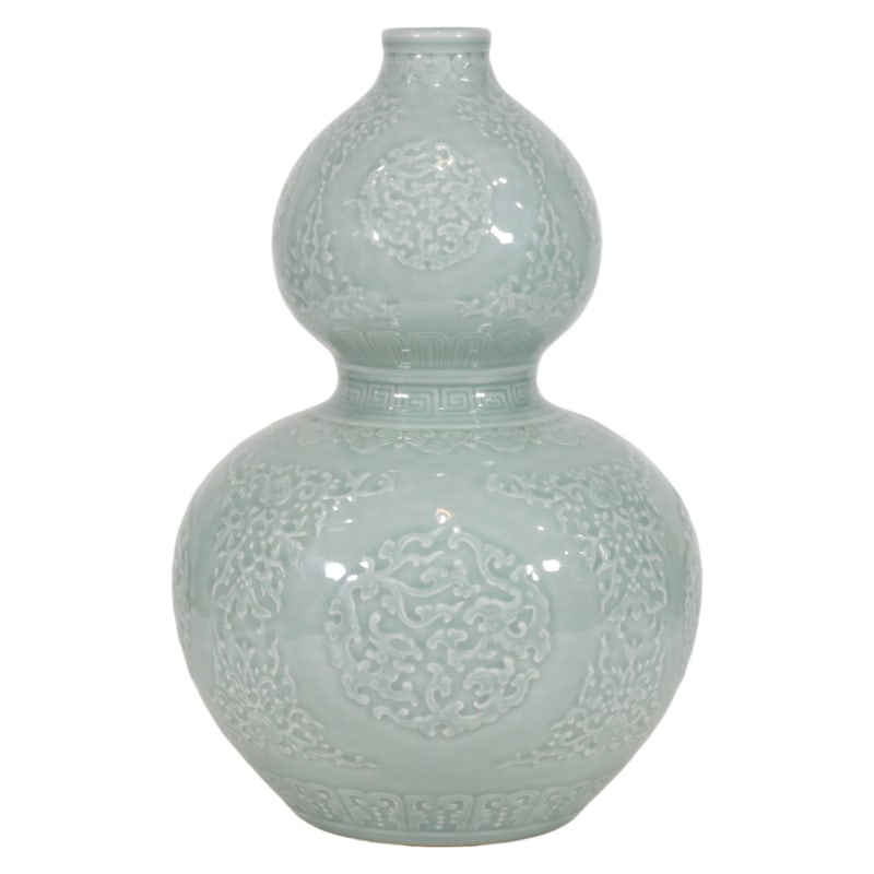 CELADON-GLAZED GOURD-SHAPED BOTTLE WITH CARVED DRAGON DESIGN: Height 32.8 cm