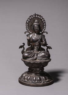 A SILVER FIGURE OF BUDDHA SHAKYAMUNI.: A SILVER FIGURE OF BUDDHA SHAKYAMUNI.