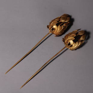 A PAIR OF GILT-BRONZE 'Floral' HAIR PINS.: A PAIR OF GILT-BRONZE 'Floral' HAIR PINS.