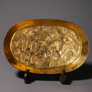 A FINELY CARVED GILT-BRONZE OVAL DISH.: A FINELY CARVED GILT-BRONZE OVAL DISH.