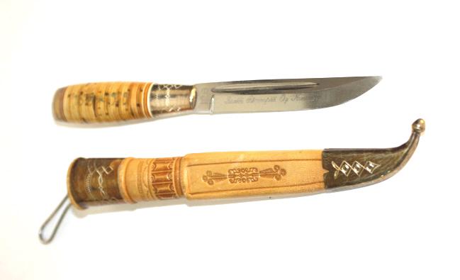 Nordic Finland Puukko Leather Bone Fishing Knife Nordic: Nordic Finland Puukko Leather Bone Fishing Knife, with embossed leather casing and engraved wooden inlaid handle as well as small engraved markings on the metal grip. Signed Iisakki Jarvenpaa Oy and h