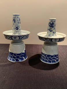 Early 19th Century Ching Dynasty Pair of Chinese blue and white .: Early 19th Century Ching Dynasty Pair of Chinese blue and white candlesticks with a dragon on the neck of the candlestick in good condition