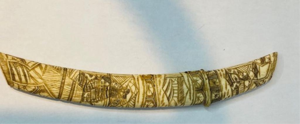 18th century Bone Dagger, Japan, Chinese 19th century, the scabbard: 18th century Bone Dagger, Japan, 19th century, the scabbard finely carved in relief with samurai figures amidst a landscape with pavilions