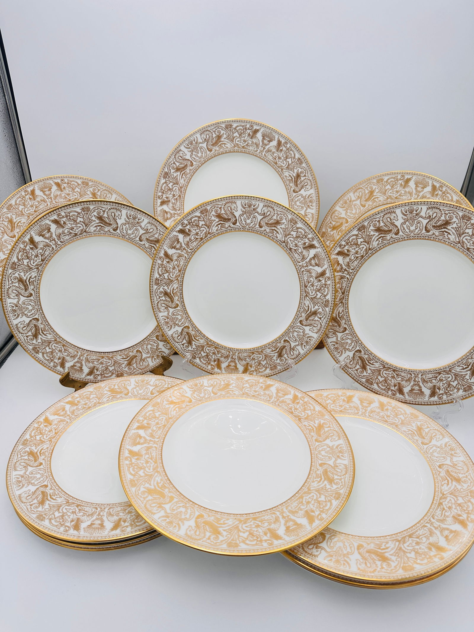 Set of 13 plates Wedgwood Gold Florentine Bone China Plates – Made in England dinner plates: Set of 13 plates Wedgwood Gold Florentine Bone China Plates – Made in England An elegant and luxurious set of Wedgwood Gold Florentine bone china plates, pattern number W4219, made in England. These