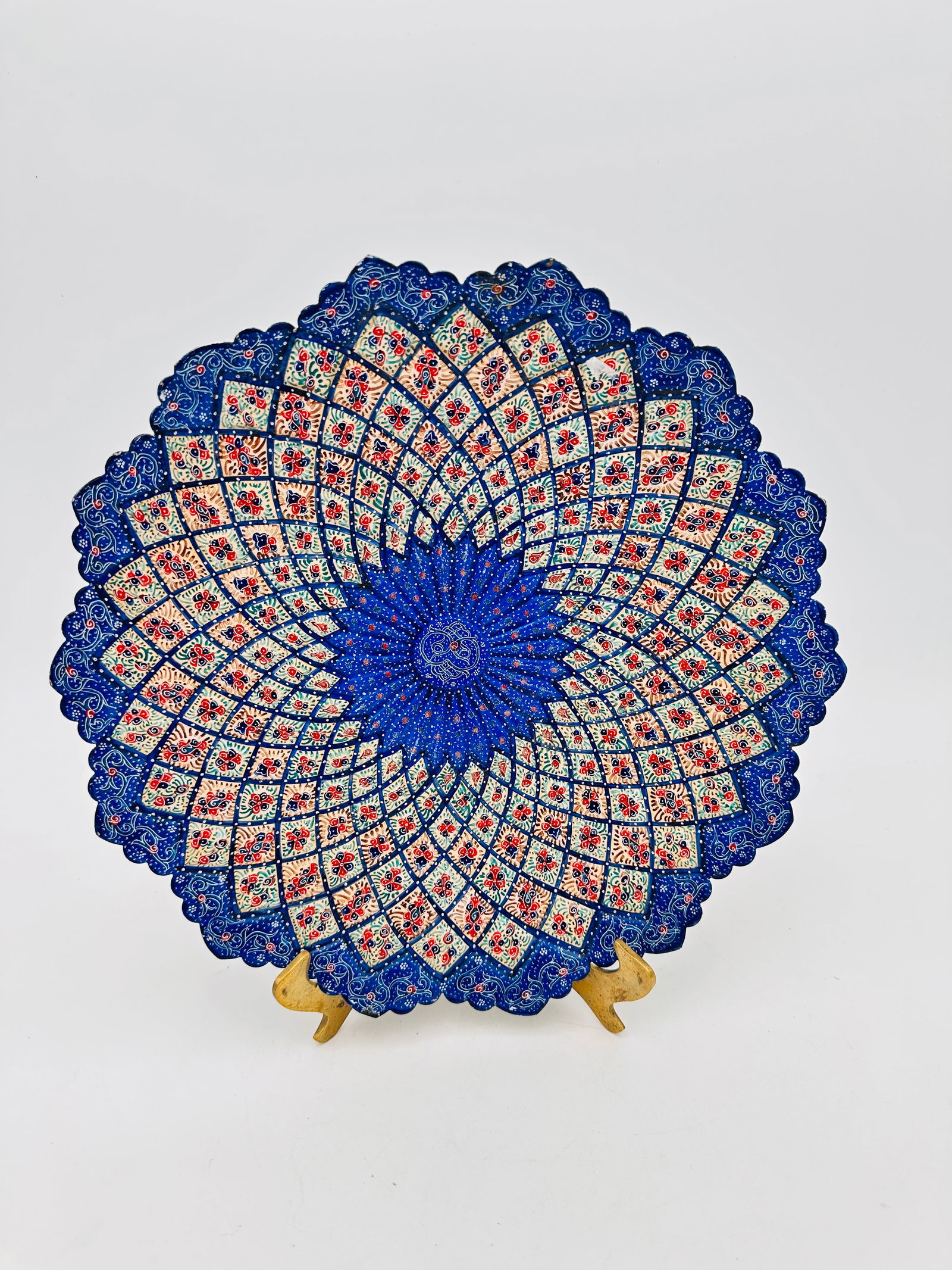 Persian Hand-Painted Mina Kari Enamel Plate: Persian Hand-Painted Mina Kari Enamel PlateA stunning example of traditional Persian craftsmanship, this large hand-painted Mina Kari (enamel) plate features a mesmerizing radial floral motif in rich 