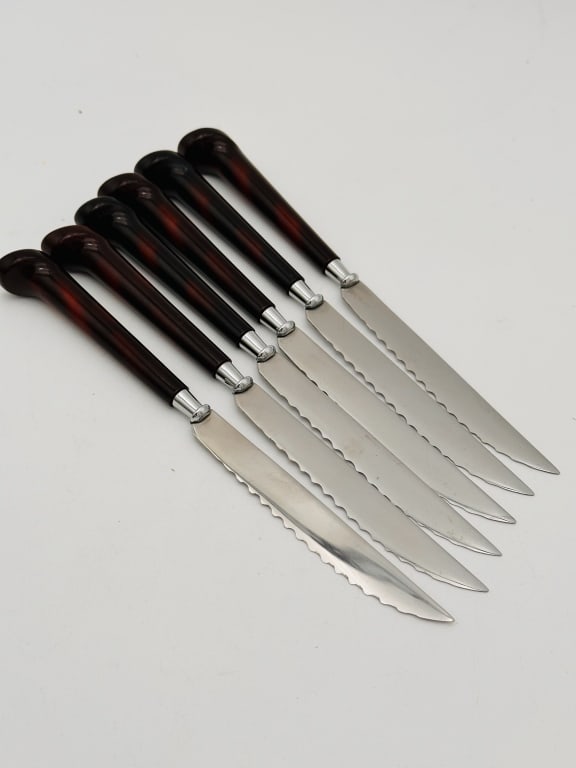 6 knifs baklite chery amber . (1 of 2)