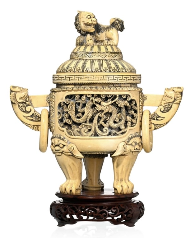 18th hard carving elephant tusk covered ding incense burner , China: decorated with dragons chasing the flamed pearl in the clouds, with two handles decorated with Foo dogs, with movable ring, feet in the shape of a Foo dog's paw and head, lid grip in the shape of a Fo