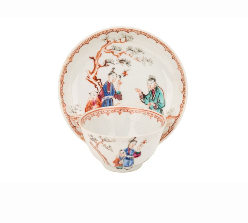 Chinese Famille Rose Tea Bowl and Saucer, Qianlons Chinese Famille Rose Tea Bowl and Saucer,: Chinese Famille Rose Tea Bowl and Saucer, Qianlong Period (17th Century)A fine Chinese porcelain tea bowl and matching saucer, delicately hand-painted with figures in a garden scene beneath a pine tre