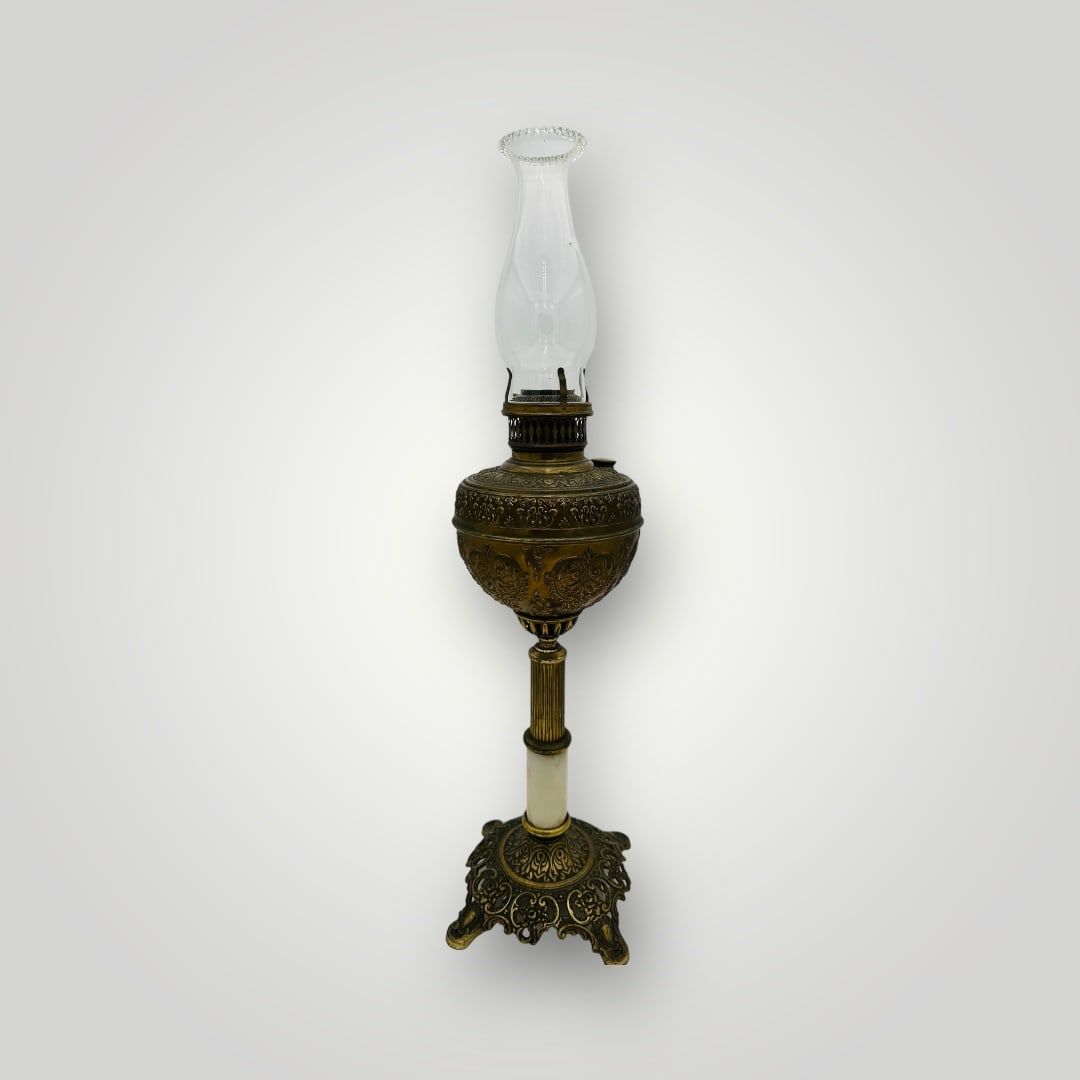 ANTIQUE BANQUET OIL LAMP Electrified Marble Stem Antique Victorian Brass and Marble Oil Lamp with: Antique Victorian Brass and Marble Oil Lamp with Etched Glass Chimney ? Late 19th CenturyAn elegant Victorian oil lamp, featuring an elaborately embossed brass reservoir with classical floral motifs,