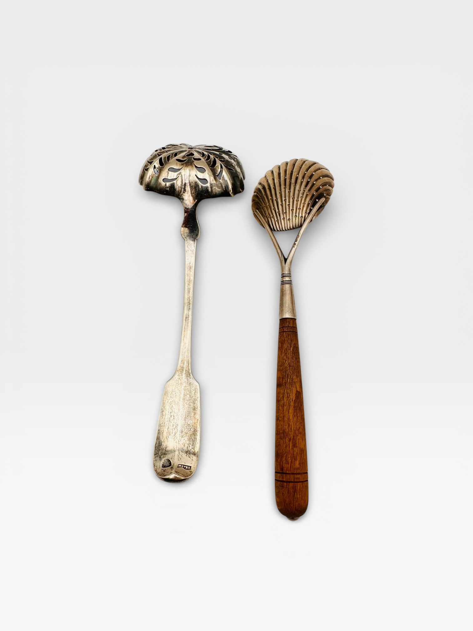 Antique Russian Silver Serving Spoon and Fish Server, 19th Century, 84 Zolotnik Hallmarks: A fine antique Russian silver serving group, consisting of a pierced serving spoon and a fish server, both crafted in solid silver and bearing Russian imperial hallmarks, including the “84” zo