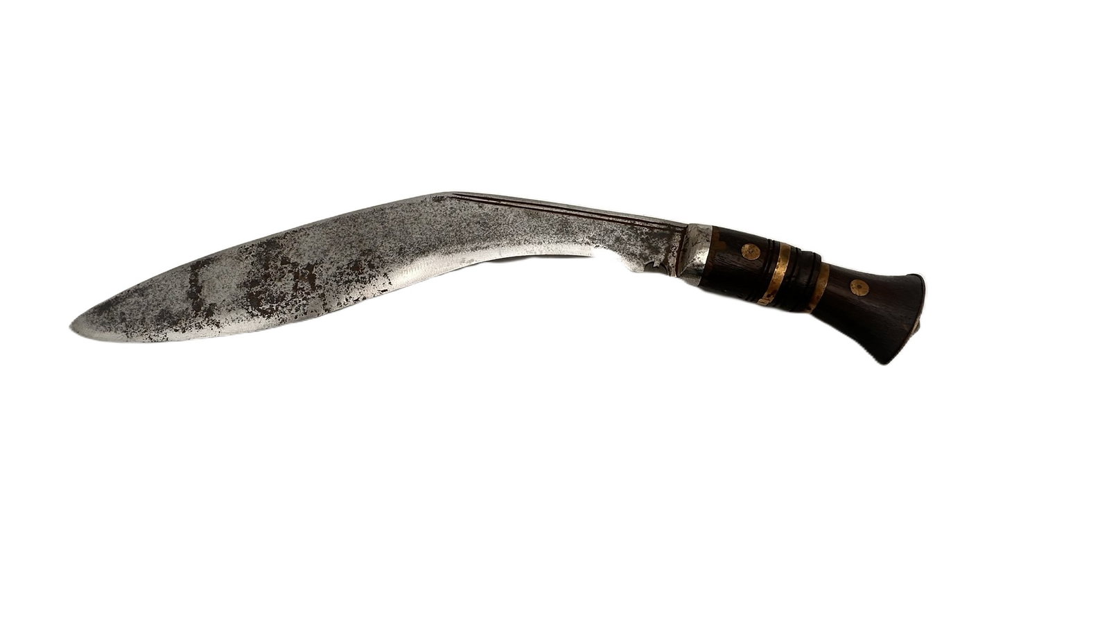 A classic Gurkha kukri knife featuring a heavy curved single-edged steel blade with a deep belly: A classic Gurkha kukri knife featuring a heavy curved single-edged steel blade with a deep belly and sharpened inward curve, showing age-related oxidation and use marks. The handle is crafted from dar
