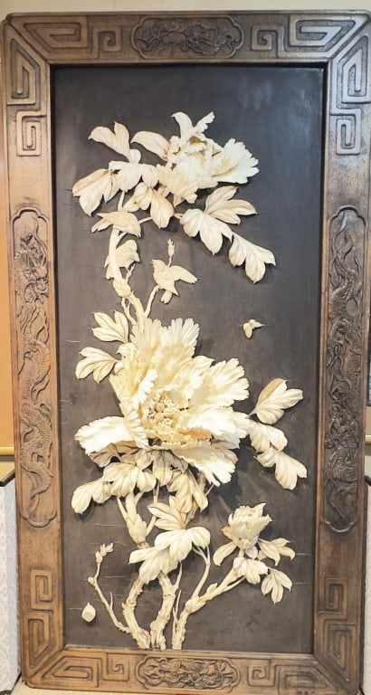 Japanese Shibayama plaque Finely carved Japanese relief panel depicting peony blossoms: Japanese Shibayama plaque Finely carved Japanese relief panel depicting peony blossoms and birds in flight, the naturalistic elements executed in high relief and mounted against a dark ground. The com